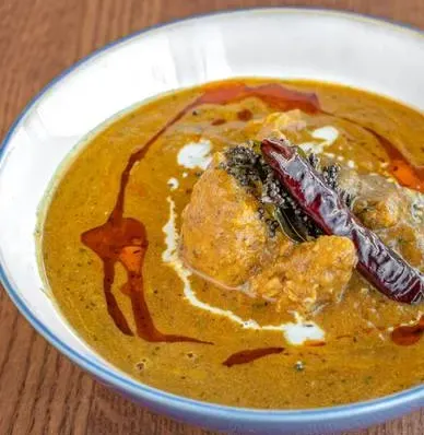 Slow-simmered chicken in a rich sauce at Melita Restaurant and Bar in Melita, MB