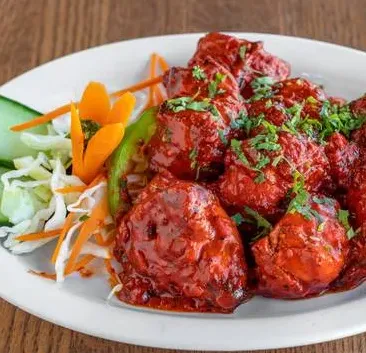 Plate of saucy chicken bites at Melita Restaurant and Bar in Melita, MB